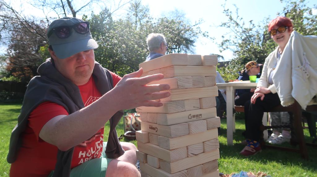 Someone playing Jenga