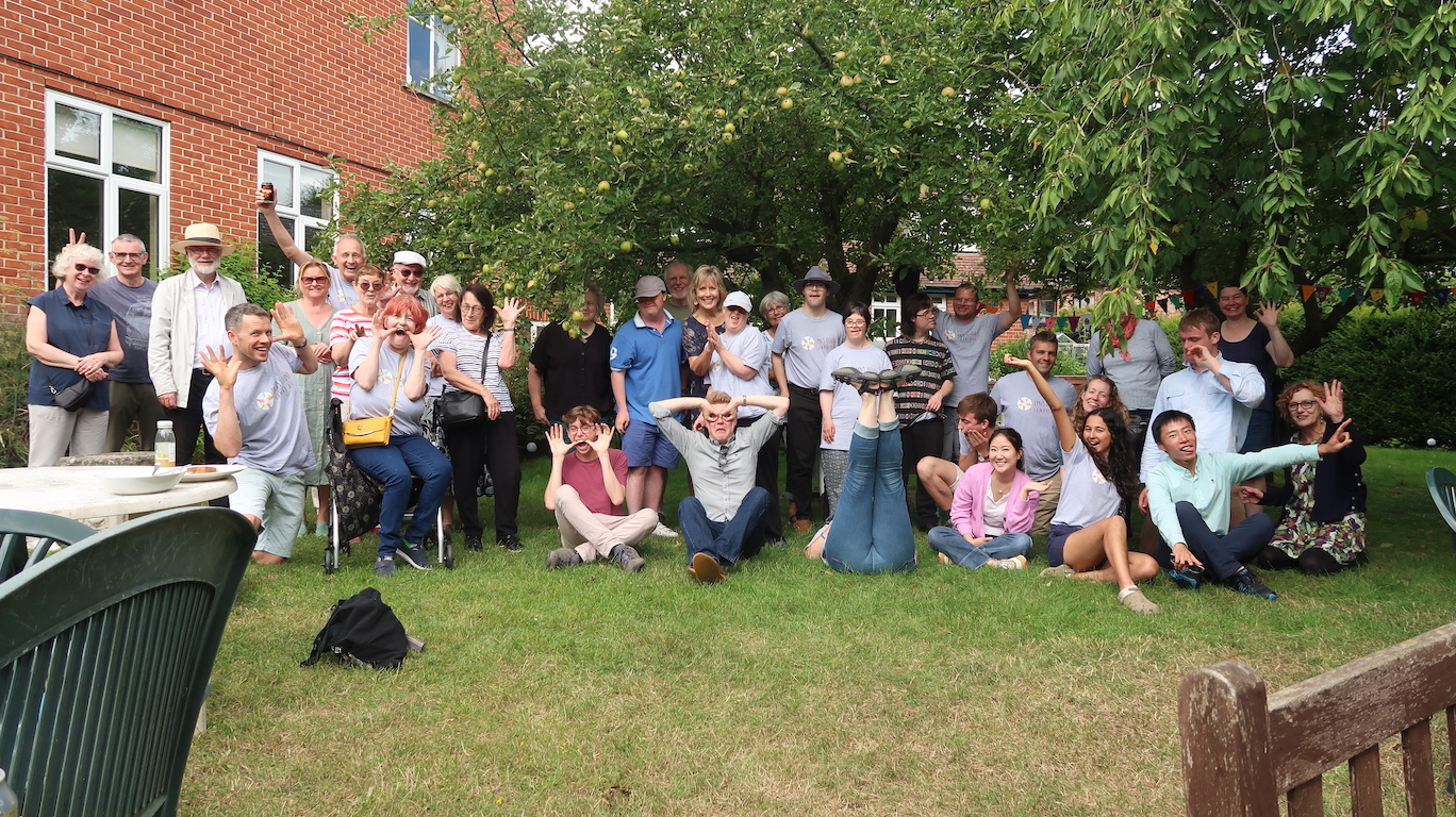 A large group-photo of the Lyn's House community